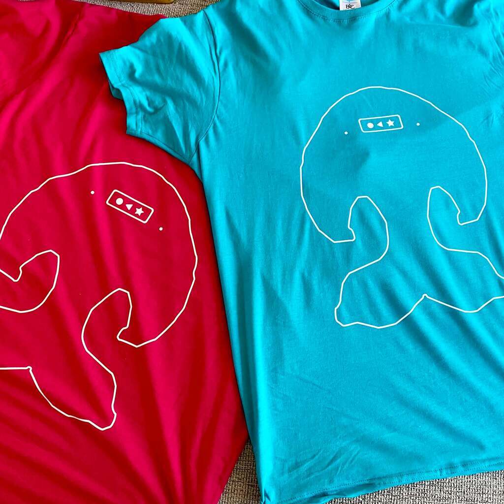 Receive our unique T-shirt designed by Susan Au